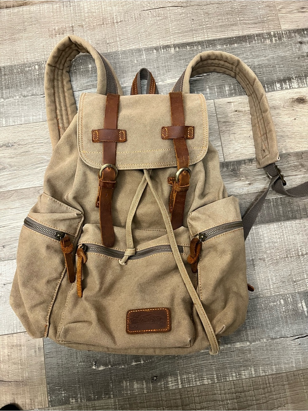 Khaki Canvas Drawstring Backpack with Brown Leather Trim